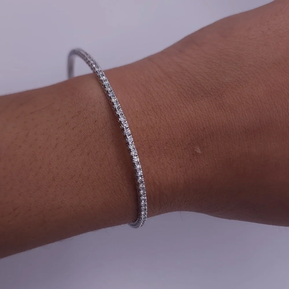 14 k w gold flexible bangle tennis bracelet w/over 3 carats of natural diamonds. - Picture 1 of 6